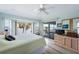 Spacious main bedroom with large windows offering water views at 8245 Manasota Key Rd, Englewood, FL 34223