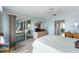 Main bedroom with balcony access and views of the water at 8245 Manasota Key Rd, Englewood, FL 34223