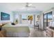 Main bedroom with water views and access to a private balcony at 8245 Manasota Key Rd, Englewood, FL 34223