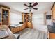 Home office with built-in shelves and a desk at 8245 Manasota Key Rd, Englewood, FL 34223