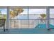 Screened porch overlooking the water at 8245 Manasota Key Rd, Englewood, FL 34223