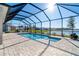 Screened pool and spa with lake view at 8565 Saint Kitts Cir, Englewood, FL 34224