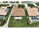 Aerial view of single-Gathering home with tile roof and backyard patio at 8596 Lakeside Dr, Englewood, FL 34224