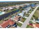 Aerial view of property highlighting location and canal access at 93 Rotonda Cir, Rotonda West, FL 33947