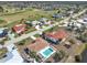 Aerial view showing home's location in community with golf course at 93 Rotonda Cir, Rotonda West, FL 33947
