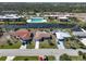 Aerial view of home and community, showcasing canal views at 93 Rotonda Cir, Rotonda West, FL 33947