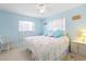 Bedroom with a queen bed, and coastal decor at 93 Rotonda Cir, Rotonda West, FL 33947