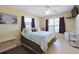 Spacious bedroom with a comfortable bed and plenty of natural light at 93 Rotonda Cir, Rotonda West, FL 33947