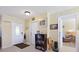 Inviting entryway with built-in shelving and access to living room at 93 Rotonda Cir, Rotonda West, FL 33947