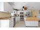 Kitchen boasts granite countertops, stainless steel appliances, and an island at 93 Rotonda Cir, Rotonda West, FL 33947
