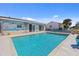Refreshing blue pool, surrounded by a patio at 93 Rotonda Cir, Rotonda West, FL 33947