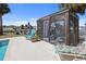 Screened gazebo and lounge chairs near the pool at 93 Rotonda Cir, Rotonda West, FL 33947