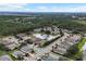 Aerial view showcasing home's location in a tranquil, residential neighborhood at 9507 Carnaby Dr, Venice, FL 34293