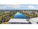 Wonderful aerial of community, capturing the natural beauty of the neighborhood at 9700 Fiddlers Green Cir # 117, Rotonda West, FL 33947