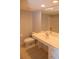 Bathroom featuring a toilet, vanity, and sink, offering functionality at 9700 Fiddlers Green Cir # 117, Rotonda West, FL 33947