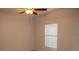 Bedroom with a ceiling fan and window providing natural light at 9700 Fiddlers Green Cir # 117, Rotonda West, FL 33947