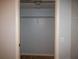 Bedroom closet with a hanging rod for optimal organization at 9700 Fiddlers Green Cir # 117, Rotonda West, FL 33947