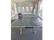 Game room with ping pong table and equipment at 9700 Fiddlers Green Cir # 117, Rotonda West, FL 33947