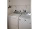 The laundry room features appliances, and is ready to handle all your washing and drying needs at 9700 Fiddlers Green Cir # 117, Rotonda West, FL 33947