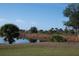 This home boasts beautiful pond views and stunning mature tropical landscaping at 9700 Fiddlers Green Cir # 117, Rotonda West, FL 33947