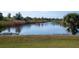 Stunning views of pond and mature landscaping make this a peaceful retreat at 9700 Fiddlers Green Cir # 117, Rotonda West, FL 33947