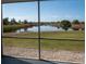 Enjoy serene pond views from this screened lanai for peaceful outdoor living at 9700 Fiddlers Green Cir # 117, Rotonda West, FL 33947