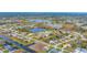 Aerial view of a large community with lakes at 1 Sportsman Ter, Rotonda West, FL 33947