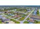 Aerial community view, showcasing homes and waterways at 1 Sportsman Ter, Rotonda West, FL 33947