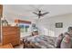 Cozy bedroom with a queen bed and view of the yard at 1 Sportsman Ter, Rotonda West, FL 33947