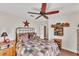 Charming bedroom with a queen bed and rustic decor at 1 Sportsman Ter, Rotonda West, FL 33947