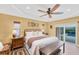 Spacious bedroom with king-size bed and pool view at 1 Sportsman Ter, Rotonda West, FL 33947