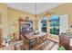 Charming farmhouse-style dining room with ample natural light at 1 Sportsman Ter, Rotonda West, FL 33947