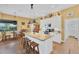 Modern kitchen featuring white cabinets and granite countertops at 1 Sportsman Ter, Rotonda West, FL 33947