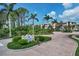 Community entrance with landscaping at 102 Natures Way # 2305, Rotonda West, FL 33947