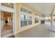 Covered hallway with access to unit and outside views at 102 Natures Way # 2305, Rotonda West, FL 33947