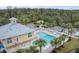 Community pool, clubhouse and parking at 102 Natures Way # 2305, Rotonda West, FL 33947