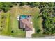 Bird's eye view of single Gathering home and landscape at 10451 Hatchett Cir, Port Charlotte, FL 33981