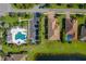 Aerial view of community pool and villas at 10820 Trophy Dr, Englewood, FL 34223