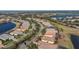 Aerial view of a home nestled in a tranquil neighborhood at 10820 Trophy Dr, Englewood, FL 34223