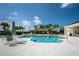 Relaxing community pool with patio furniture at 10820 Trophy Dr, Englewood, FL 34223