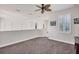 Spacious loft area with neutral carpeting and large window at 117 Cable Dr, Rotonda West, FL 33947