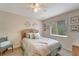 Cozy bedroom with a double bed and calming decor at 13235 Essman Ave, Port Charlotte, FL 33953