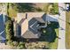 Top-down aerial view showing a single-Gathering home with pool and driveway at 13575 Chenille Dr, Port Charlotte, FL 33981