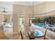 Breakfast nook with glass table and pool view at 13575 Chenille Dr, Port Charlotte, FL 33981