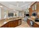 Well-equipped kitchen featuring granite countertops and ample cabinetry at 13575 Chenille Dr, Port Charlotte, FL 33981