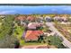 Aerial view of a waterfront home with tile roof at 14173 Myakka Pointe Dr, Port Charlotte, FL 33953