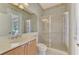 Bathroom with walk-in shower, toilet and single vanity at 14173 Myakka Pointe Dr, Port Charlotte, FL 33953