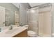 Clean bathroom with a shower/tub combo, vanity, and toilet at 14394 Silver Lakes Cir, Port Charlotte, FL 33953