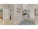 Spacious entryway with views into the living room and hallway at 14394 Silver Lakes Cir, Port Charlotte, FL 33953