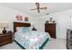 Guest bedroom with a queen-size bed and dresser at 1505 Fireside St, Port Charlotte, FL 33952